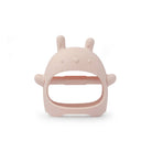 Pink silicone teething mitt in a rabbit design on a white background